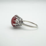Vintage silver ring with domed carnelian gemstone in claw setting