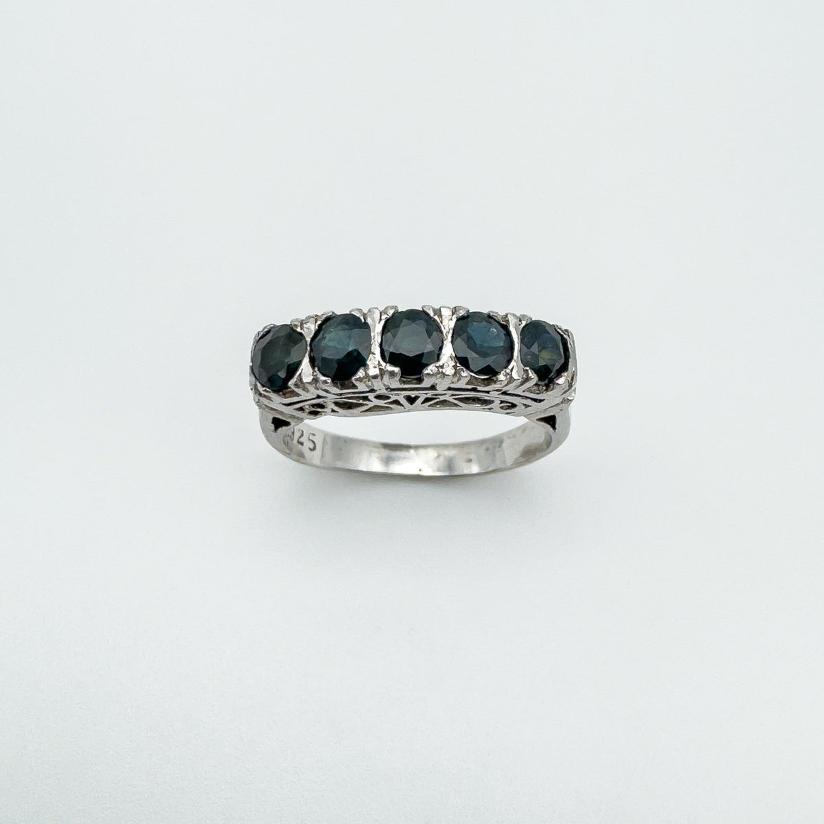 Sterling silver ring with 0.75ct sapphires viewed at an angle to show gem depth