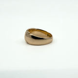 Side angle of antique 12ct rose gold band ring showing engraving and rounded top