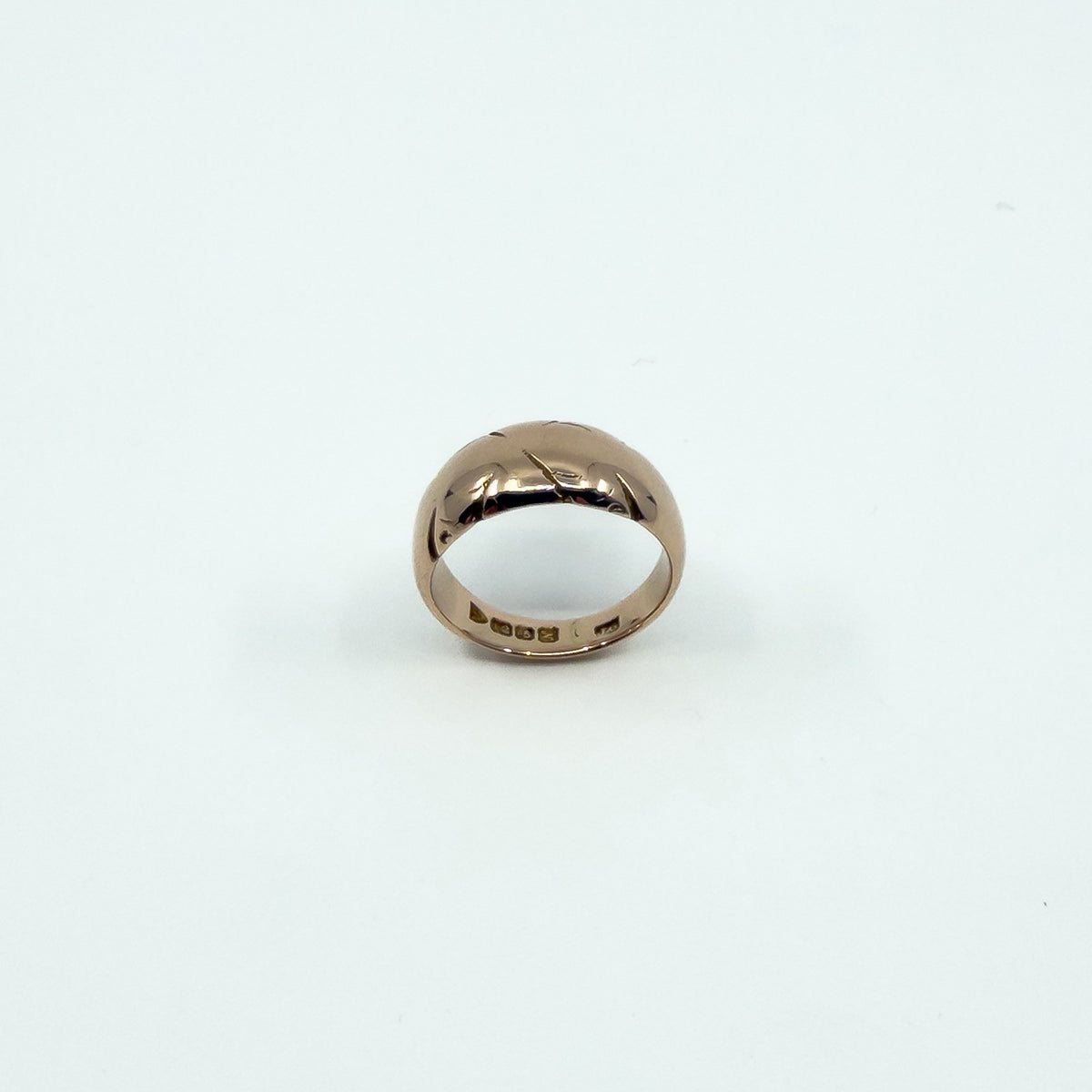 Front view of antique 12ct rose gold wide band ring, Size J, showing Art Nouveau engraved pattern