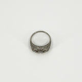 Underside view of platinum diamond ring showing the pierced gallery