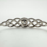 Reverse view showing openwork Celtic pattern and CZ setting from the back