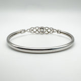Reverse view showing the polished solid silver band and Celtic back detail