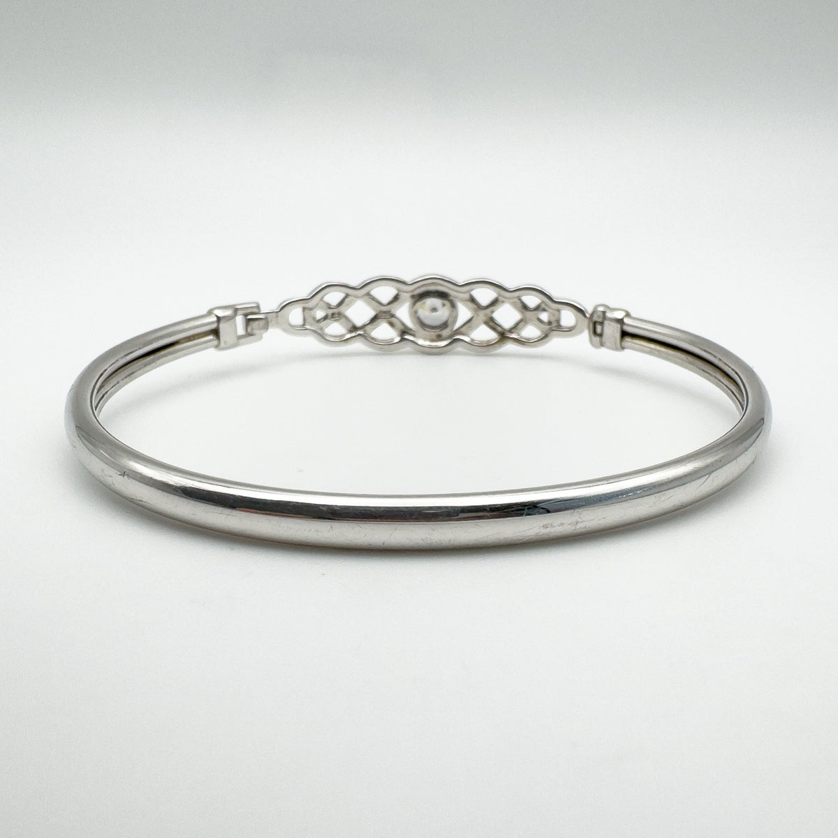 Reverse view showing the polished solid silver band and Celtic back detail