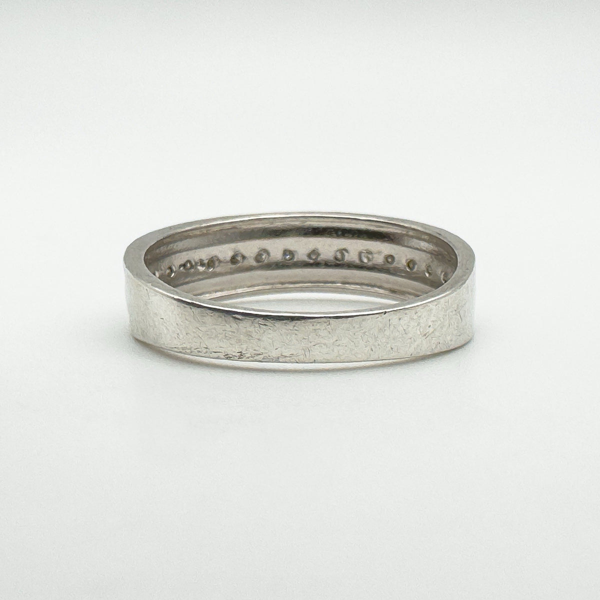 View of the reverse side of the sterling silver band with concave edges