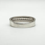View of the reverse side of the sterling silver band with concave edges