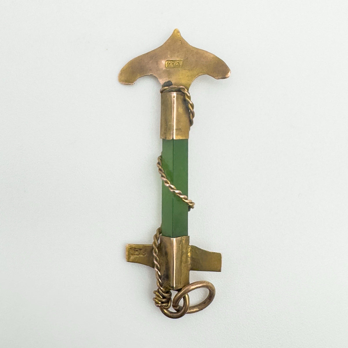 Reverse of 9ct gold anchor pendant showing hallmark and jade inlay