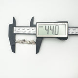 Measuring width of Celtic sterling silver brooch at 44mm