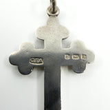 Close up of CEA maker mark and Birmingham 1900 hallmarks on the back of the silver cross