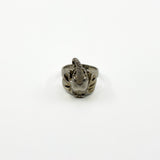 Rear view of chunky sterling silver elephant ring showing the band and elephant head shape