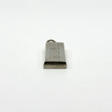 End view of the chunky sterling silver ingot pendant showing the bail and solid rectangular form.