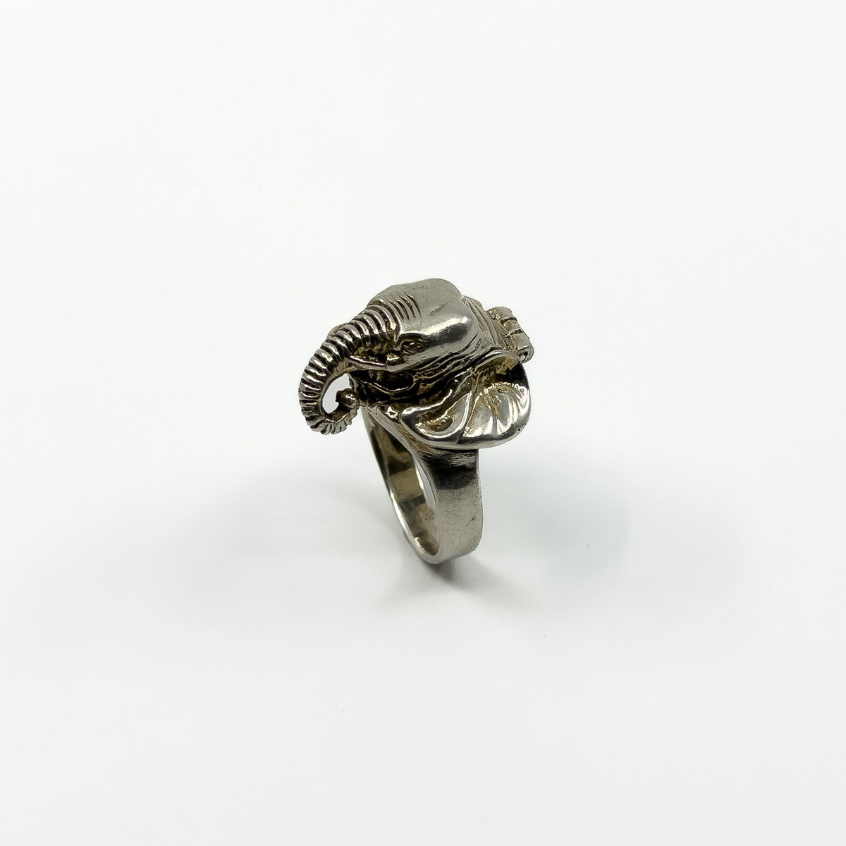 Chunky vintage sterling silver elephant locket ring with raised trunk and wide band