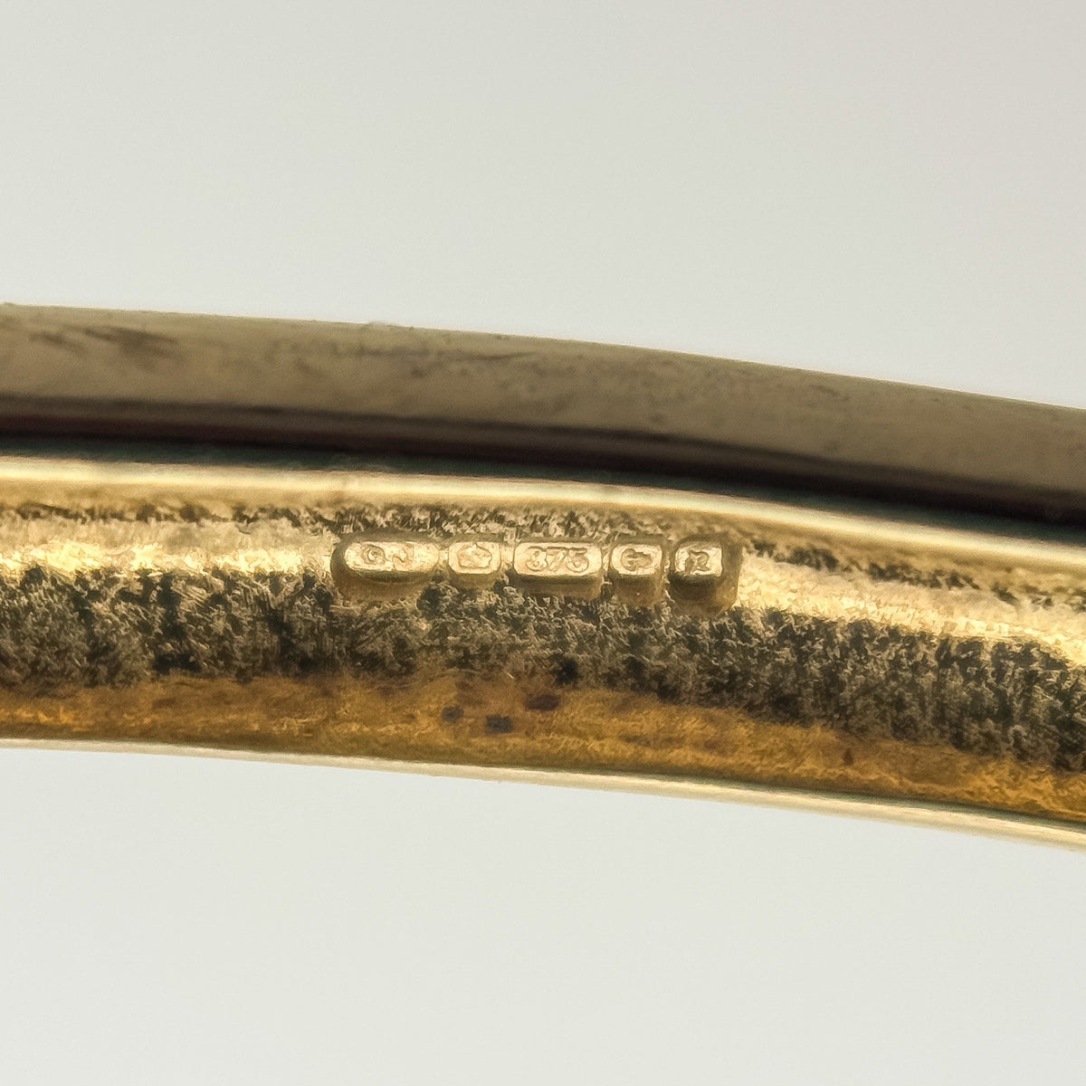 Clear 375 gold hallmark and maker's mark inside vintage