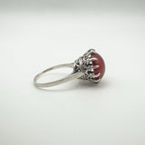 Ornate crown-style mount of sterling silver carnelian solitaire ring