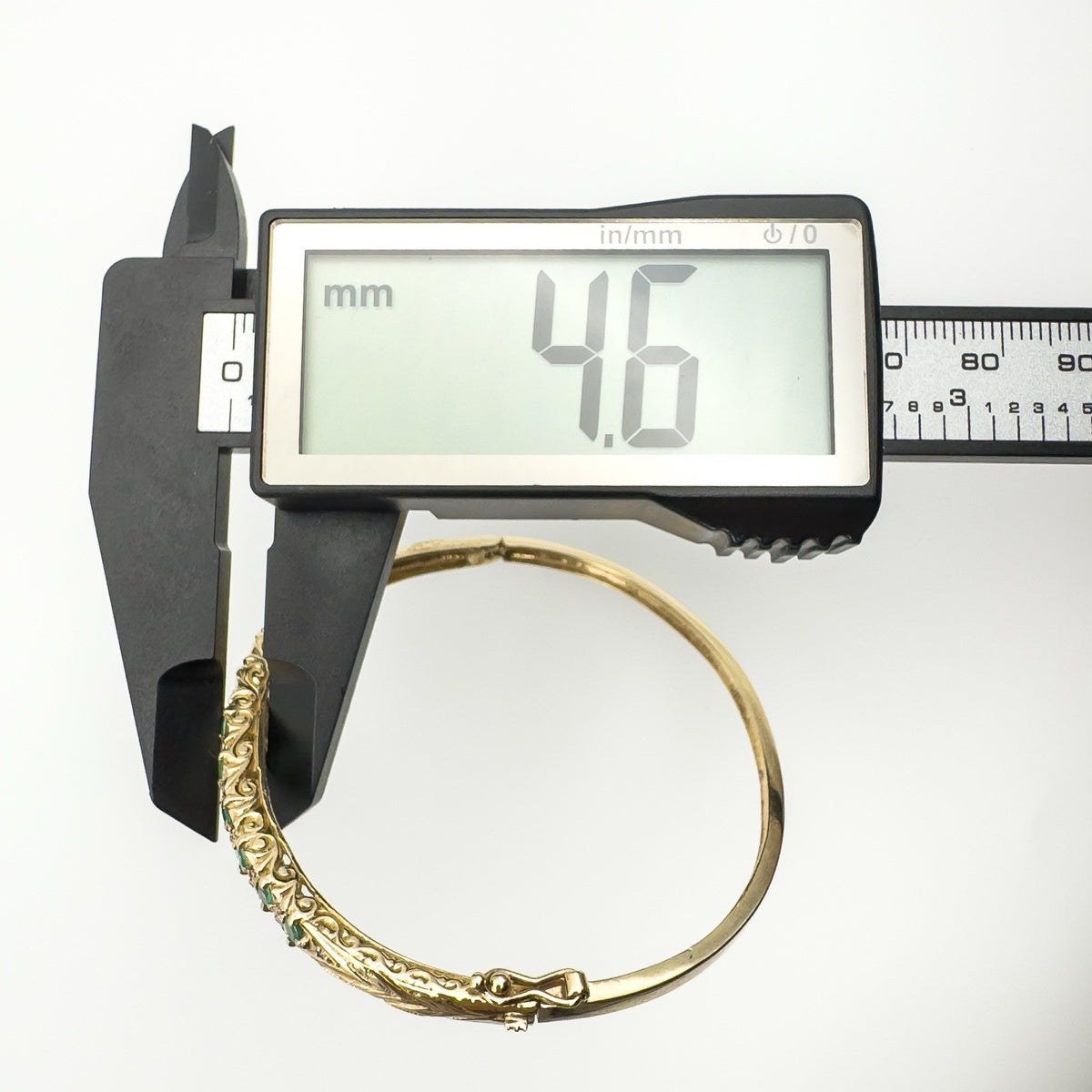 Depth of 9ct gold bangle measured at 4.6mm with caliper