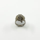 Front view of vintage sterling silver elephant locket ring with trunk, ears and wide band