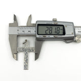 Sterling silver engraved cross pendant shown measuring approximately 28.1mm wide.