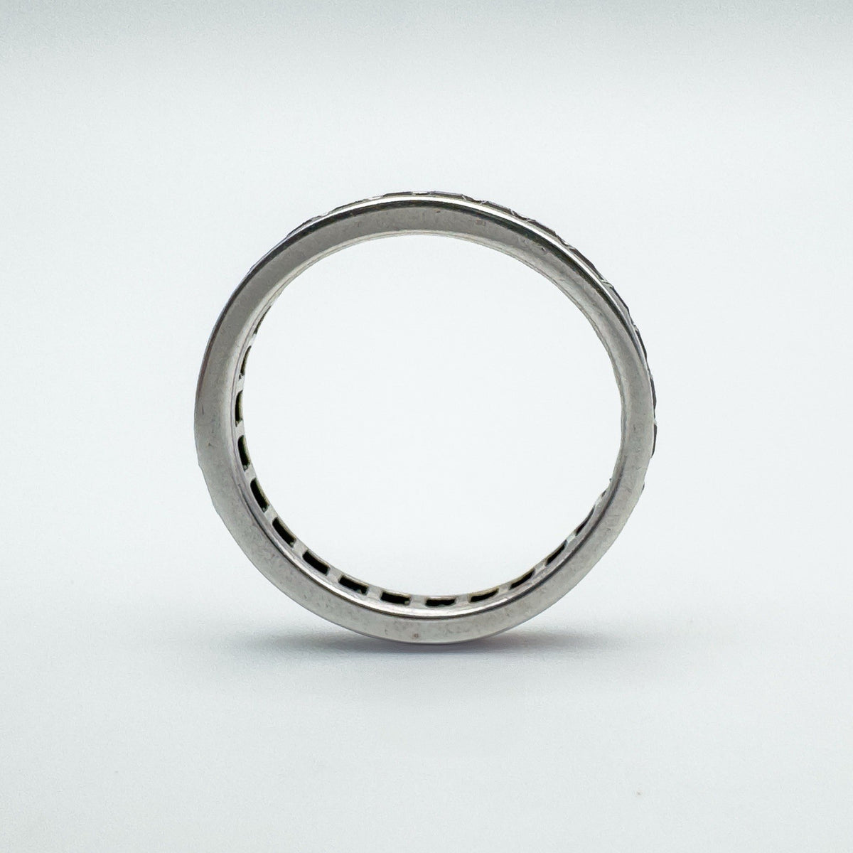 Clean view of full eternity ring showing band width and setting detail