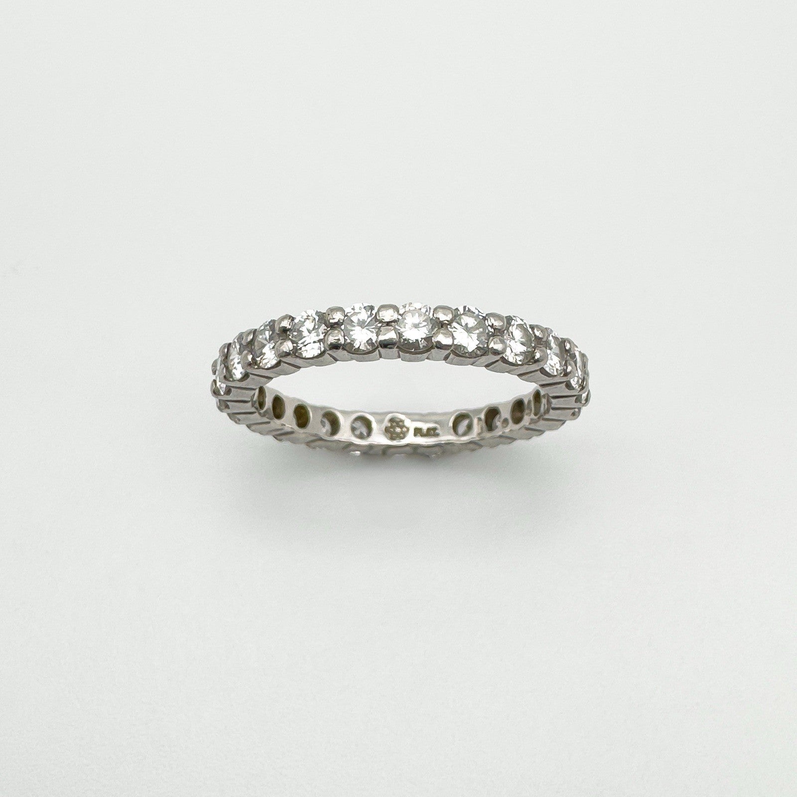 Inside of platinum full eternity ring with diamond weight and hallmarks