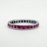 18ct white gold eternity ring showing full ruby side in polished setting