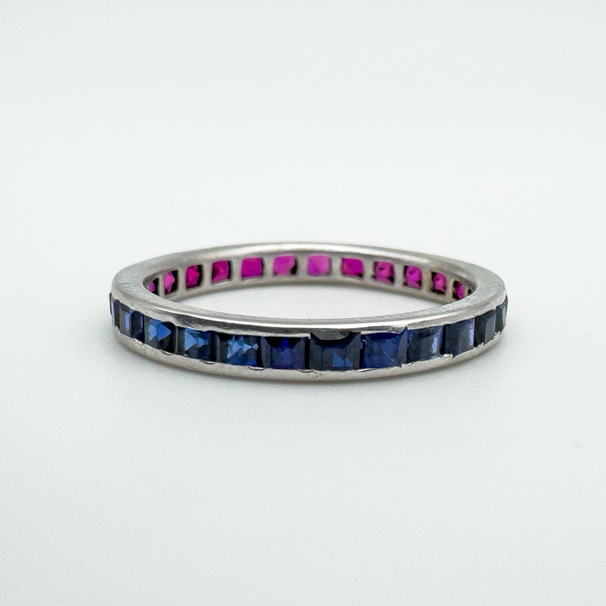 Vintage eternity ring in white gold with sapphire channel set side facing forward