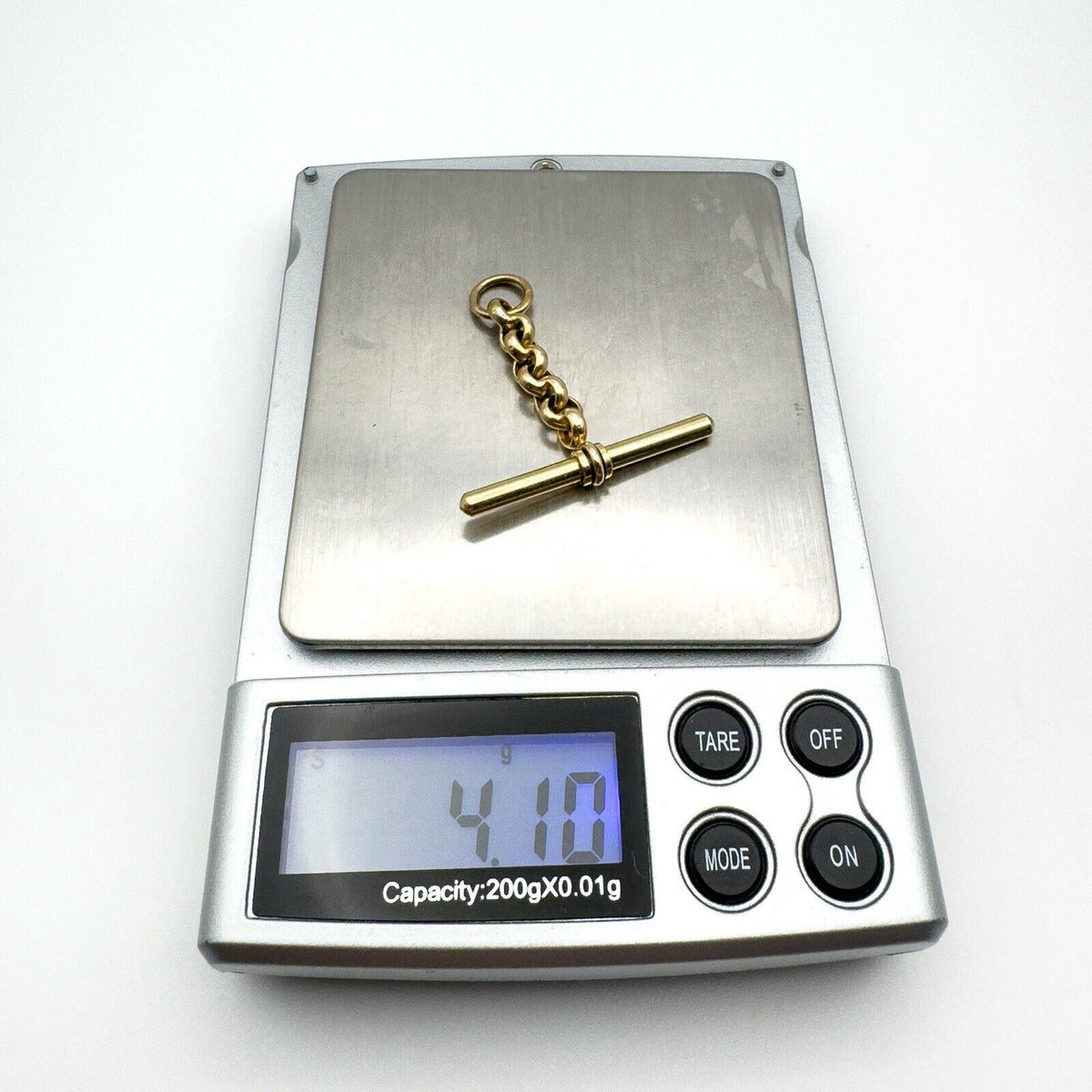 Vintage 9ct gold T-bar pendant weighing approx. 4.10g on digital scale