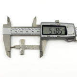 Vintage sterling silver cross pendant shown measuring approximately 51.8mm long.