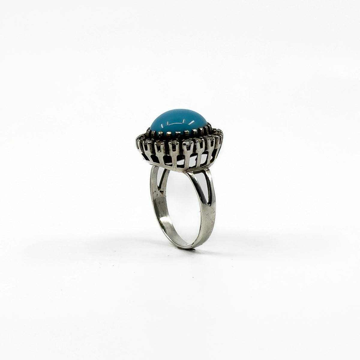 Large sterling silver ring with turquoise centre and natural diamond halo detail