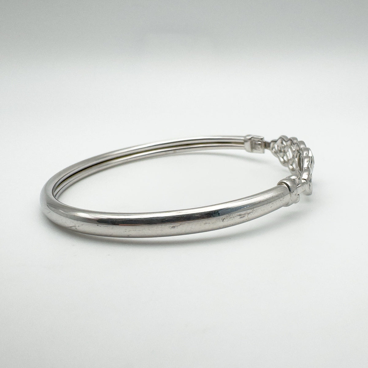 View from the left showcasing clean bangle shape and smooth finish