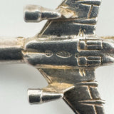 Detailed view of 925 and other markings stamped below the wing