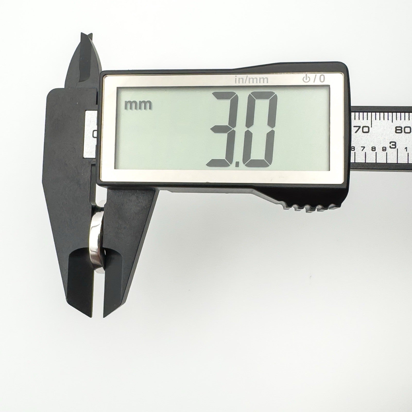 Caliper displaying the width of the earring band as 3.0mm in sterling silver