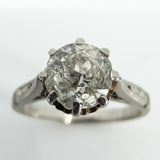 Close up of antique old-cut diamond in eight-claw platinum solitaire ring setting