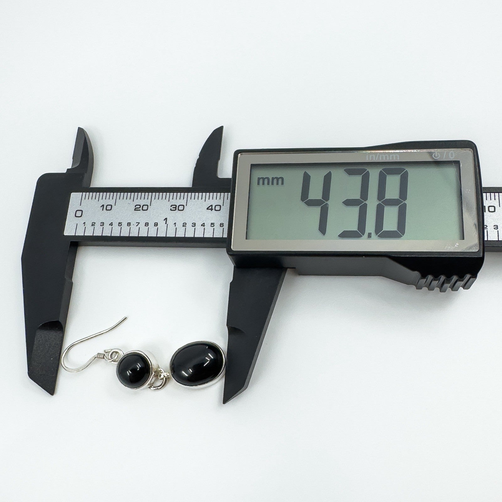 Black onyx drop earring measured at approximately 43.8mm long with digital callipers