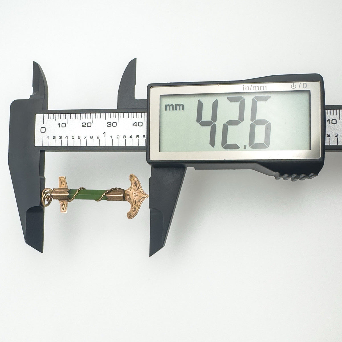 Antique gold anchor pendant measured at 42.6mm with digital caliper