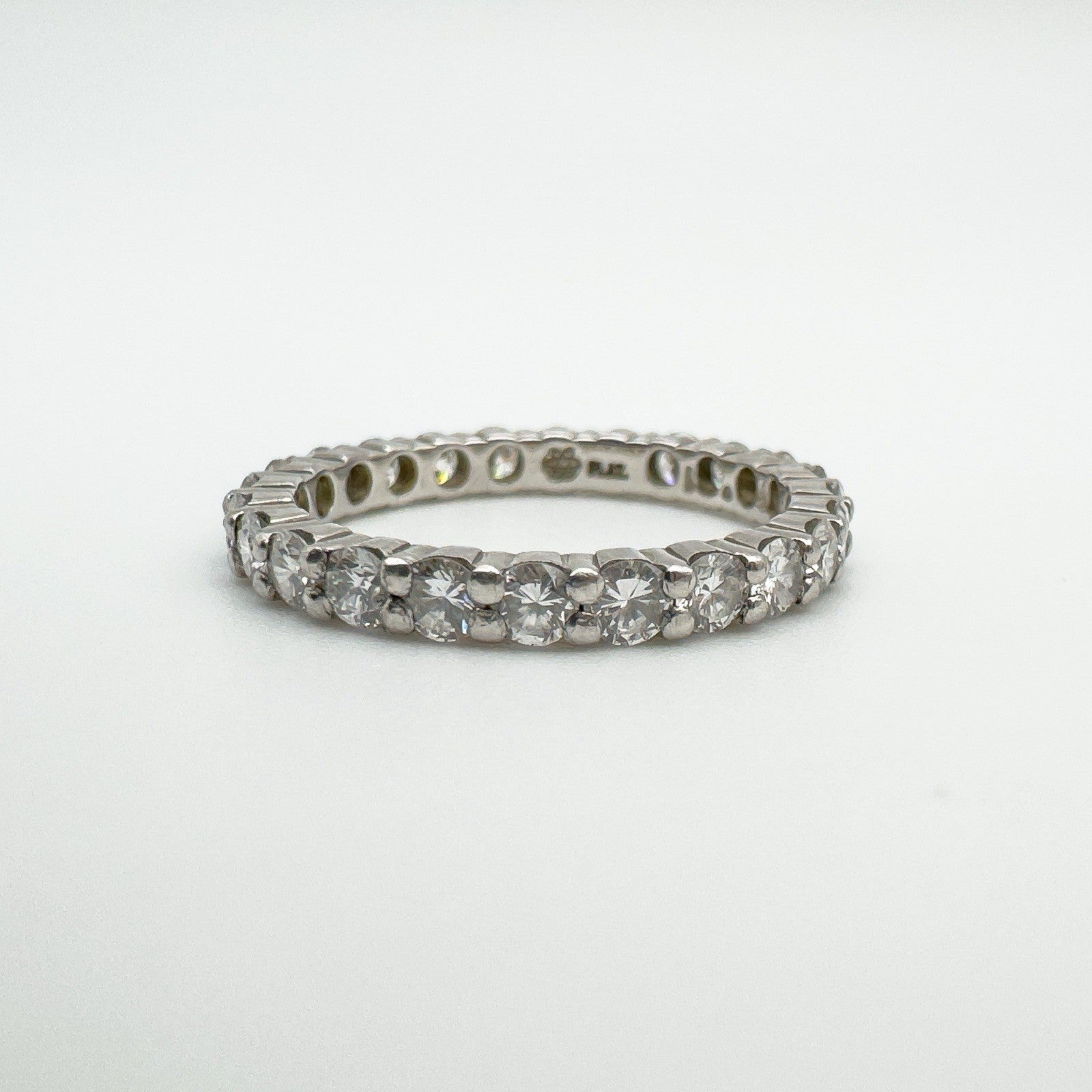 Platinum full eternity ring with natural diamonds, front view