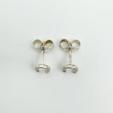 Back view of sterling silver horseshoe earrings with posts and scrolls