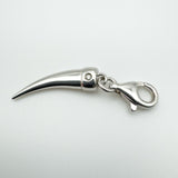 Side view of sterling silver tooth charm with natural diamond and 925 lobster clasp