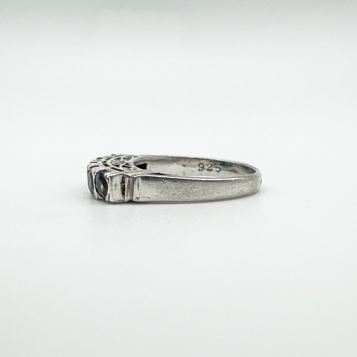 Side view showing 925 stamp on inner band of vintage sapphire ring