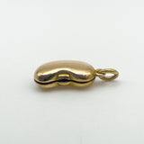 18ct yellow gold kidney bean locket pendant showing hinge and closure detail