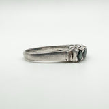 Side of ring showing sapphire setting height and smooth band curve