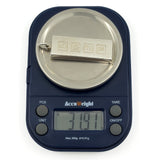 Sterling silver ingot pendant on scales showing an approximate weight of 31.9g.