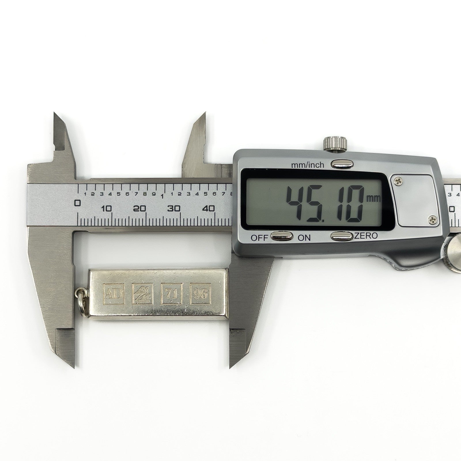Sterling silver ingot pendant measured with calipers at approximately 45.1mm long.