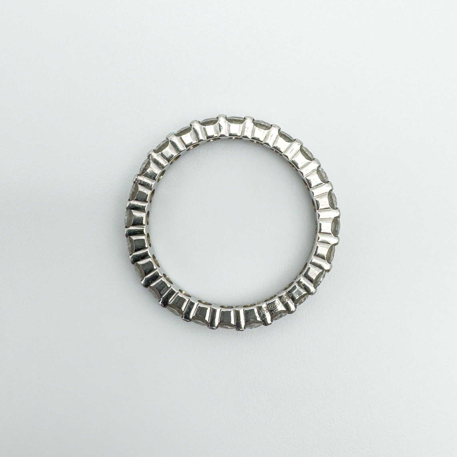 Underside of platinum diamond full eternity ring with open gallery