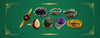 Collection of vintage gemstone rings in gold and silver with amethyst, sapphire, opal and diamond designs.