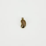 Reverse view of vintage 9ct gold lucky bean charm pendant showing its polished surface and suspension hoop.