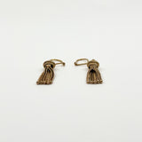 Low front view of the 9ct rose gold Albertina earrings showing the flexible tassel chains and rounded ends.
