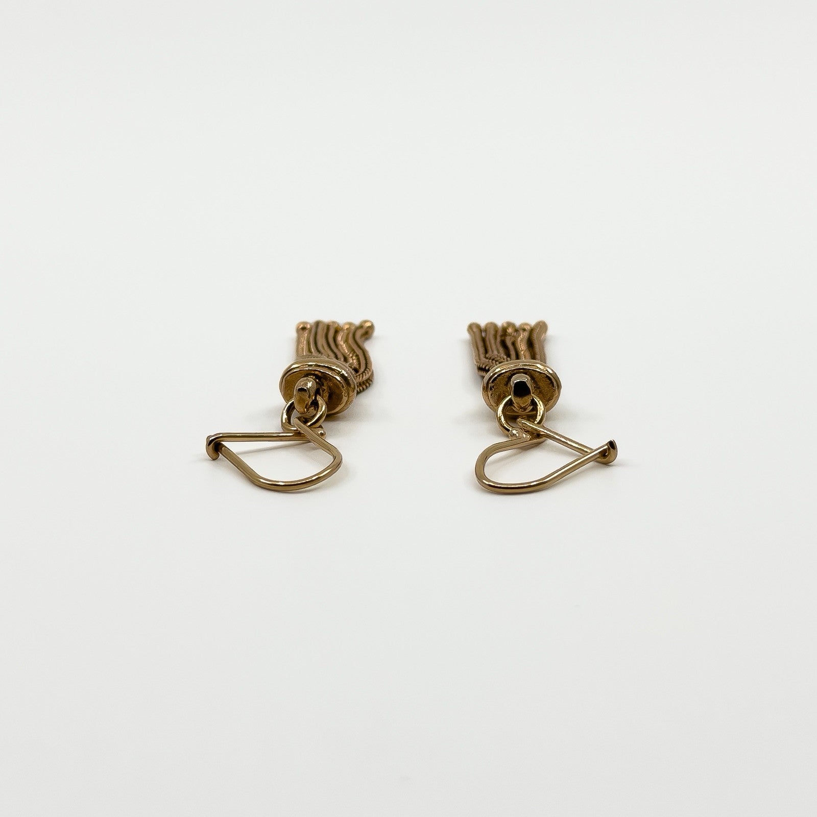 Reverse view of the vintage 9ct rose gold Albertina tassel earrings showing the hook wires and fittings.