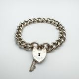 Vintage silver charm bracelet with working heart padlock and heavy curb links