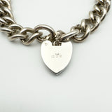 Back of heart padlock showing London 1971 hallmarks and maker’s mark F.A.R.