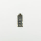 Vintage sterling silver ingot pendant showing Birmingham 1978 hallmarks on the reverse.